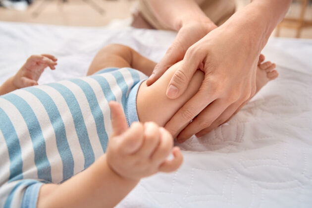 hands on therapy on a baby.